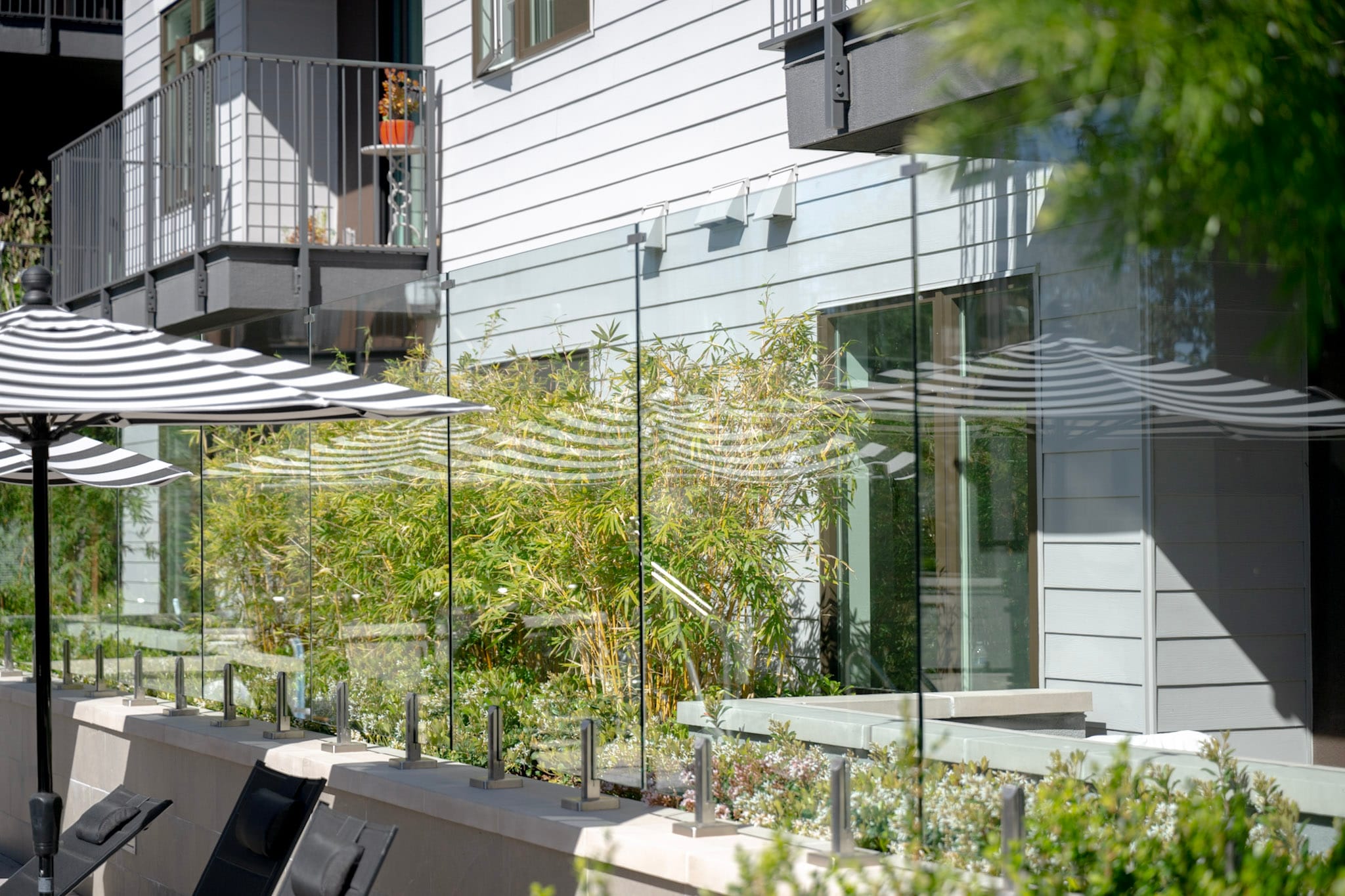 Glass windshield panel installation at a restaurant exterior