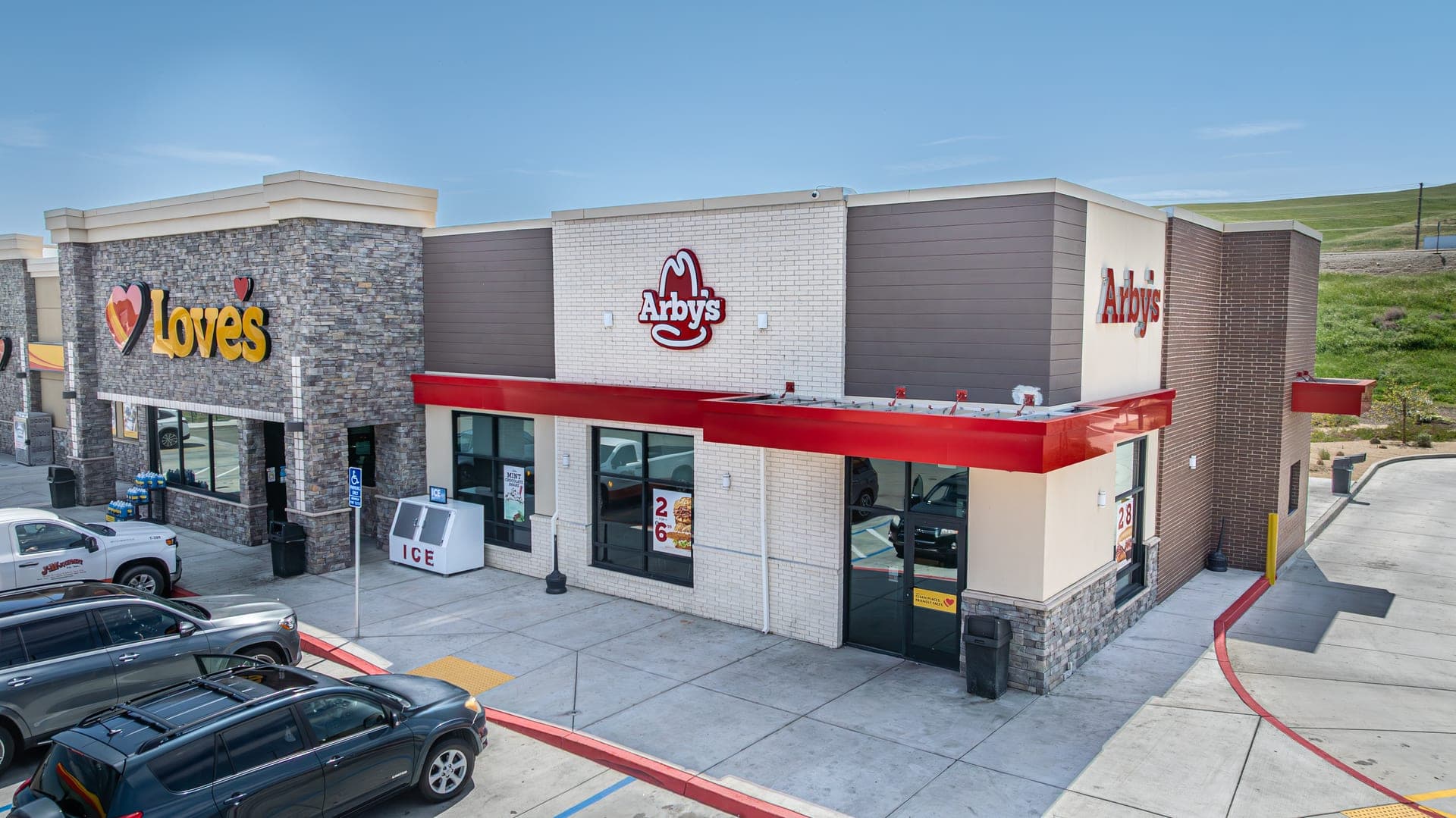 Commercial glazing at an Arby's restaurant storefront