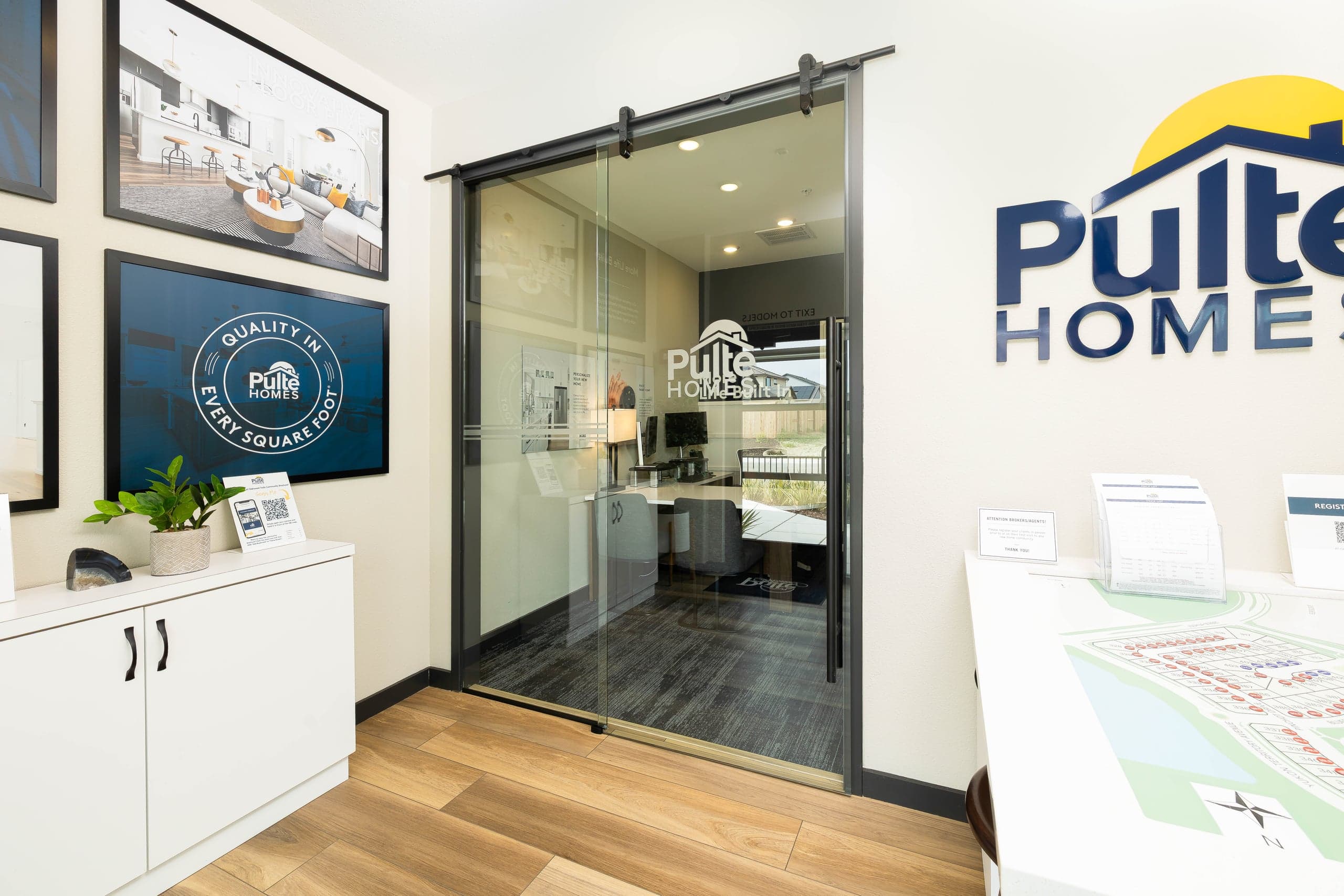 Aluminum-framed glass storefront entry at the Pulte Homes Design Center, a California job by Infinity Glass and Glazing