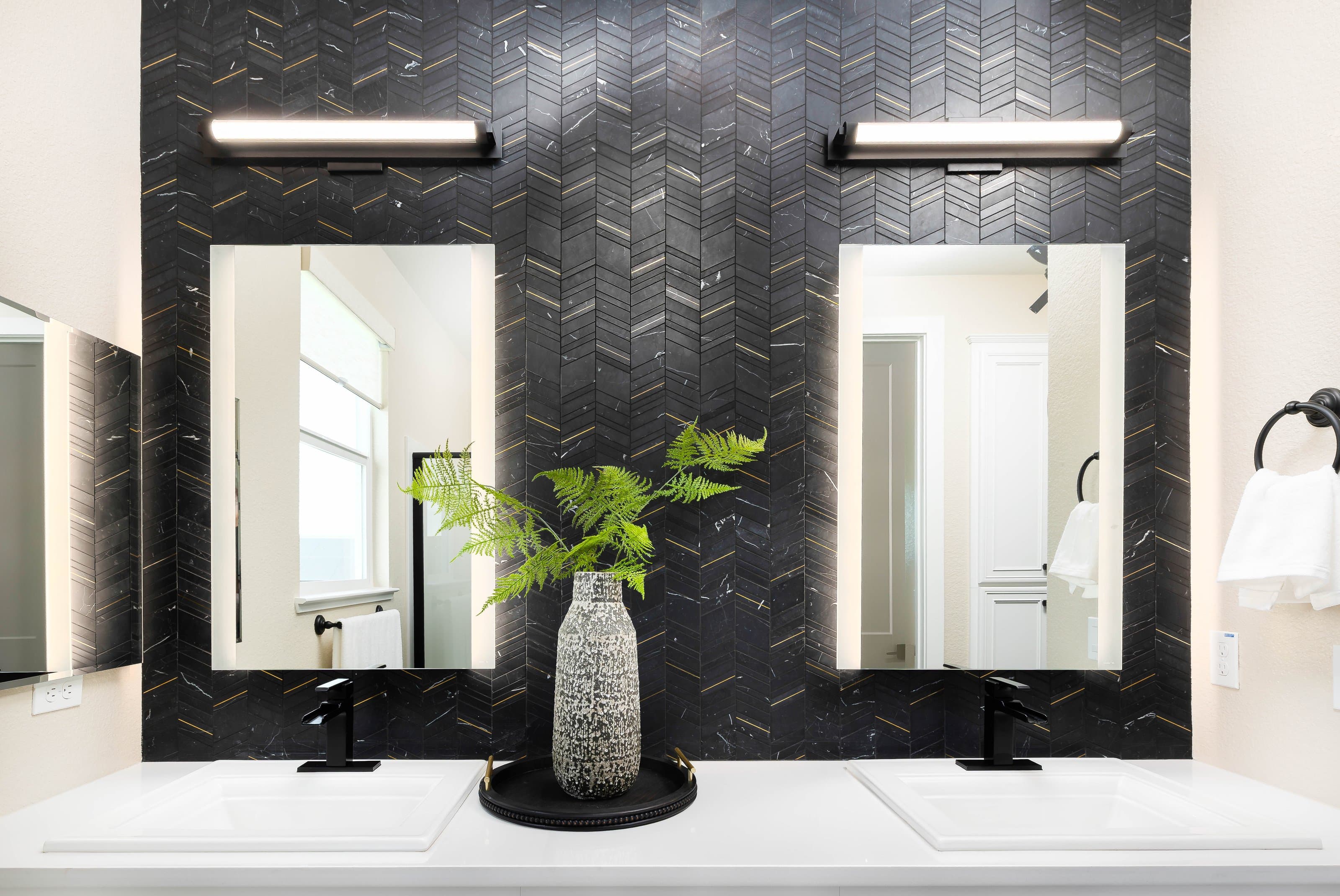 Dual vanity mirror installation by Infinity Glass