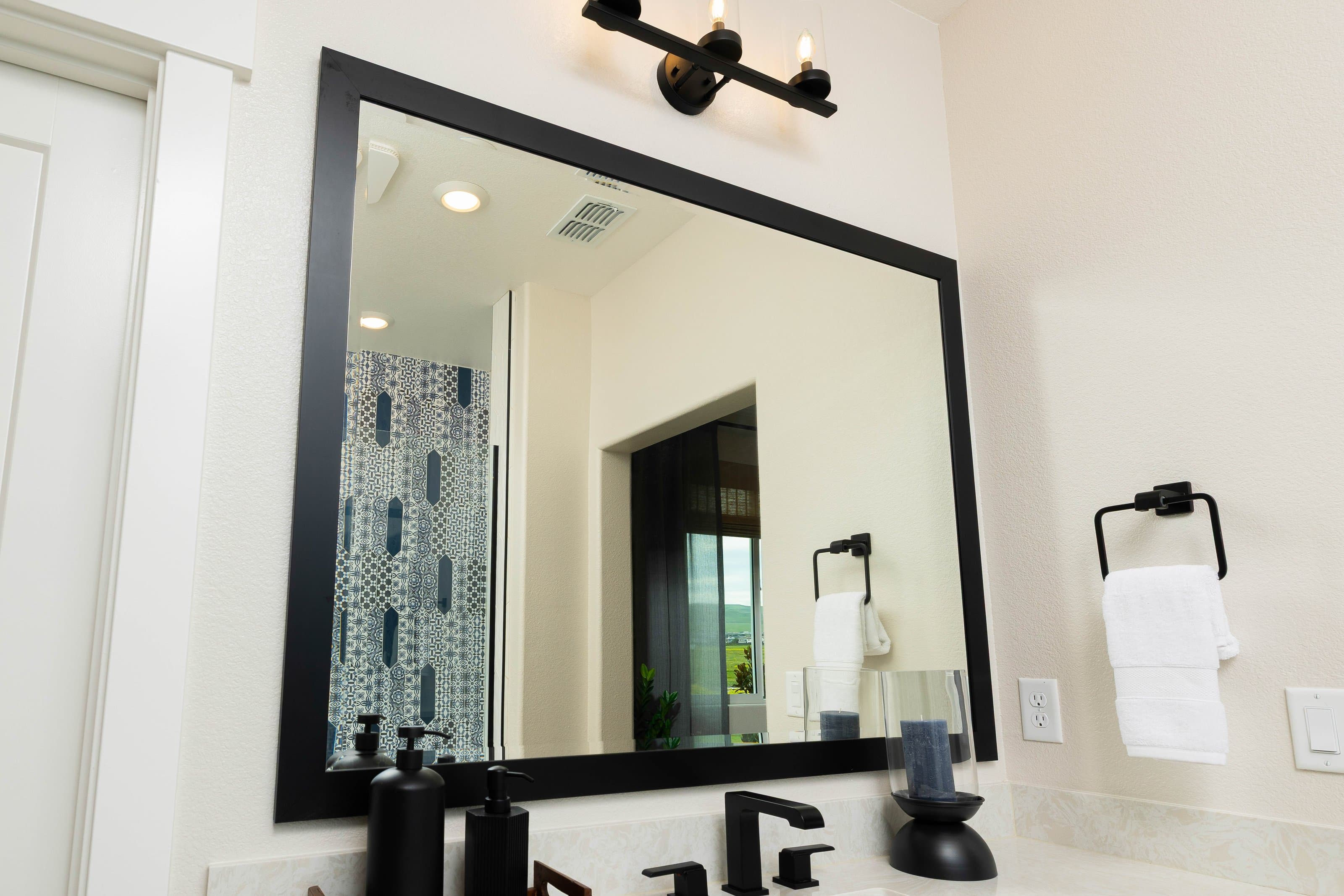 Modern mirror with black edge detail